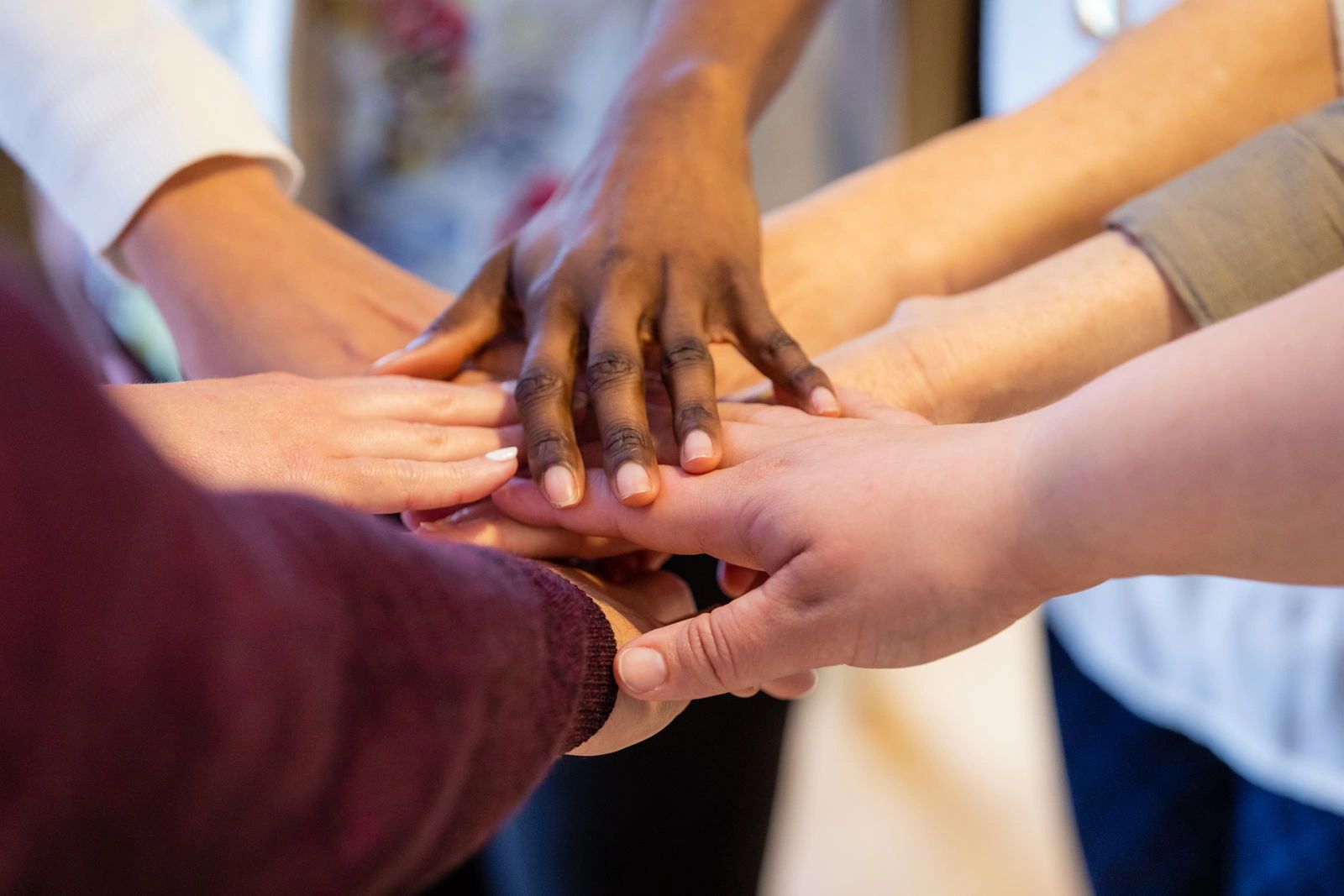 Hands joined in community unity